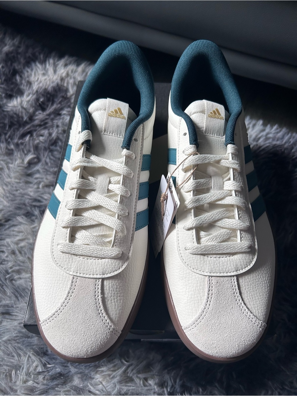 adidas Men’s White Sneakers with Teal Stripes